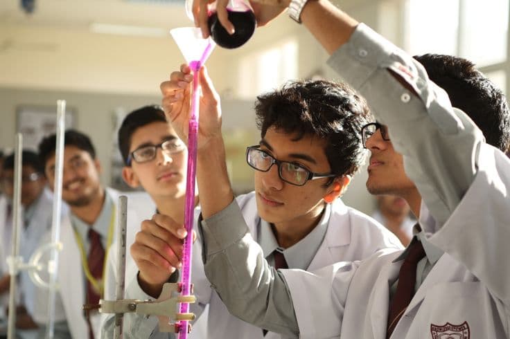 Science students learning in a classroom